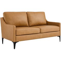 a tan leather couch with black legs