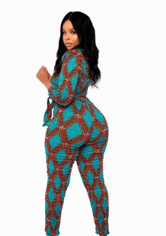 *Please advise there's other sellers on this platform using my product pictures as their own. Every design seen on my shop was created, designed and pictures are owned by EzClothin. The other shops are duplicates and replicas.  Introduce new life to your everyday wardrobe with the unique flattering design of this gorgeous Sikitu African Print Jumpsuit, and for a fuller figure has been designed to complement and enhance your figure with effortless ease. Perfect For: The Sikitu African Print Jumpsuit is perfect for all sorts of functions.  Girls night out Date night Casual hangouts All indoor events (formal or non-formal.) All outdoor events (weddings, picnics, birthday parties - etc) Features: V- neck cut Stretchy Long sleeves Detachable waist belt Extremely flattering for all body types Ru Fitted Printed Patterned Jumpsuits And Rompers, Fitted Printed Jumpsuits And Rompers, Jumpsuit Ankara, African Jumpsuit, Stretchy Jumpsuit, African Print Jumpsuit, Womens Jumpsuits, Belt Jumpsuit, Print Jumpsuit