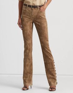 High-Rise Boot: sits above the natural waist Skinny through the hip and thigh with a slight flared leg Belt loops Zip fly with a signature buttoned closure Five-pocket styling with signature metal rivets Debossed signature leather patch at the back right waist Faux-suede lace-up cuffs Cotton, elastane Machine wash Leg Belt, Boot Jeans, Ralph Lauren Women, Suede Lace, Leather Patches, Women Lace, Rivets, Lauren Ralph Lauren, Jeans And Boots