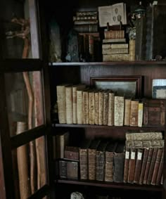 an old bookshelf filled with lots of books