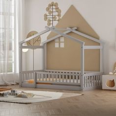 a child's room with a doll house bed and toys on the floor in front of it