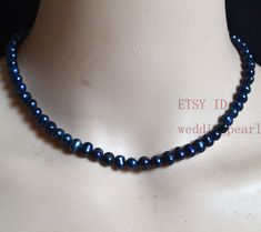 deep blue black pearl necklace, dark blue pearl necklace, cheap pearl necklace necklace length: select necklace material: freshwater pearl clasp: stainless steel lobster clasp and chain pearl body: with blemishes and ring pearl luster: high pearl shape: potato pearl size: about 5.5-6*7mm pearl colour: dyed deep blue black packaging: beautiful pouch Thank you for your viewing. The other real pearl jewelries: https://www.etsy.com/shop/weddingpearl?ref=simple-shop-header-name&listing_id=704984569&s Blue Pearl Necklace Gift, Blue Pearl Necklace For Gift, Blue Pearl Necklace For A Gift, Blue Pearl Necklace With Round Beads, Blue Pearl Drop Necklace With Round Beads, Blue Beaded Necklaces With Pearl Pendant, Blue Beaded Necklace With Pearl Pendant, Blue Pearl Necklace With Round Beads Pendant, Blue Single Strand Pearl Necklace Gift