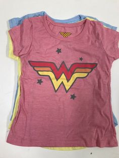 Pack of 3 Girls Wonder Women t shirts. •Brand new never worn •Cute •Pairable Great find at a great price!! T4D4 Cotton Tops With Character Print And Short Sleeves, Trendy Cotton Tops With Character Print, Pink Cotton Shirt With Character Print, Multicolor Cotton T-shirt With Screen Print, Multicolor Cotton Tops With Letter Print, Fitted Pink T-shirt With Character Print, Fitted Cotton T-shirt With Character Print, Trendy Unisex Pink Top, Trendy Multicolor Cotton T-shirt