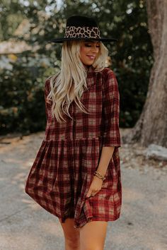 You will surely be in a cherry mood when you wear this charming tunic dress featuring lightweight material patterned with a brown and dark red hued plaid print, a v-cut neckline, loose 3/4-length sleeves, and a relaxed silhouette that falls into a straight mid-thigh length hemline! Measurements S : Bust 44", Hip 50", Length 33", Sleeve Length 15.5", Waist 44". M : Bust 46", Hip 52", Length 33.5", Sleeve Length 16", Waist 46". L : Bust 48", Hip 54", Length 34", Sleeve Length 16", Waist 48". XL : Casual Brown Plaid Dress For Fall, Casual Burgundy Dress For Fall, Bohemian Burgundy Dress For Fall, Long Sleeve Brown Plaid Dress For Fall, Fall Plaid V-neck Dress, Red Half Sleeve Dress For Fall, Red 3/4 Sleeve Dress For Fall, Bohemian Plaid Long Sleeve Dress, Plaid Bohemian Dresses For Fall