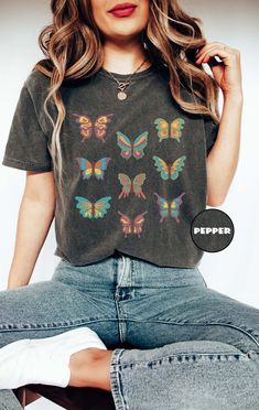 Comfort Colors® Butterfly T-shirt, Vintage Butterflies Shirt, Boho Moth Outfit, Cottagecore Women Tee, Aesthetic Butterfly Clothing Gifts HOW TO ORDER: - Please, check and review all the photos. - Select your T-shirt size from the selection box. - Select your T-shirt color from the selection box. - Personalization box is only for design color information, enter your design or text color in the personalization box (see images for options) UNLESS otherwise indicated. - Select the quantity. - Add t Multicolor Letter Print Grunge Tops, Multicolor Crew Neck Top With Butterfly Print, Casual Green Top With Butterfly Print, Cotton Multicolor Tops With Butterfly Print, Summer Cotton T-shirt With Butterfly Sleeves, Casual Black Tops With Butterfly Print, Short Sleeve Cotton Tops With Butterfly Print, Casual Black Top With Butterfly Print, Trendy Cotton Tops With Butterfly Print