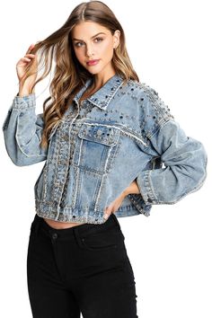 Traditional denim jacket embellished with studs and jewels all-over. Vintage wash with a baggy fit and cropped length. Patch pockets on the front and button up closure. No stretch in denim. CARE | Machine Wash Cold CONTENTS | 100% Cotton MEASUREMENTS | 20"/51 cm Top to Bottom (Size Small) MODEL | 5'8 - wearing a size Small IMPORTED Jeans Crop Top, Denim Jacket With Hoodie, Studded Denim Jacket, Faux Suede Vest, Cropped Moto Jacket, Faux Leather Vest, Crop Top With Jeans, Denim Hoodie, Pocket Jumpsuit