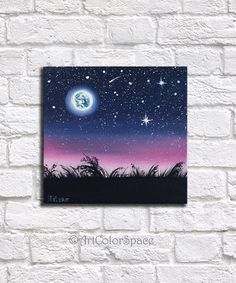 a painting on a brick wall with the moon and stars above it