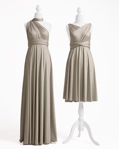 two dresses on mannequins, one in grey and the other in beige