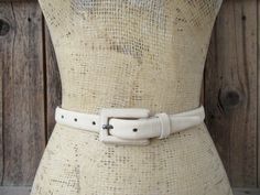 90s cream nubuck leather trouser belt. All leather. Very nice quality. Made in USA for LISA B Label size L Please compare hole placement to a belt that fits you well Holes at 29 to 33" mark  Width is 3/4" Good vintage condition with light signs of use and age such as a few very subtle marks Leather Waist Belt, Leather Trousers, Suspender Belt, Nubuck Leather, Label Sizes, Suspenders, Waist Belt, Trousers, Cream