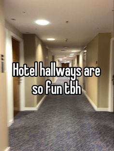 an empty hallway with the words hotel halfways are so fun bh on it