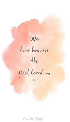 the words we love because he first loved us on a pink and orange watercolor background