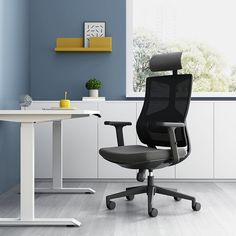 an office chair sitting in front of a desk