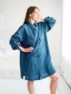 Relaxed fit oversized women's linen shirt dress LONGI in Lake Blue. Straight cut, long sleeves and two front patch pockets with flaps create an elegant look. Made from natural 100% linen, it is perfect for work or casual summer evenings. One size that fits all: XS, S, M, L, XL The model is 5′8″ (177cm) tall GARMENT SIZING - Bust: 51″ / 130 cm - Waist: 52.5″ / 134 cm - Hem: 54″ / 138 cm - Back length: 37.5″ / 95 cm - Front length: 33.5″ / 85 cm - Sleeve from the neckline: 24.5″ / 62 cm - Armhole: 5.5″ / 14 cm DETAILS ✓ 100% linen fabric ✓ Oversized fit ✓ 2 front pockets with flaps ✓ Long sleeve or 3/4 sleeve (adjust with 2 buttons) ✓ Button-up fastening at the front ✓ Made from 100% linen ✓ Available in multiple colors ✓ Medium weight linen approx. 160 GSM ✓ Pre-washed for maximum softness Flax Linen Long Sleeve Dress With Relaxed Fit, Oversized Long Sleeve Shirt Dress For Summer, Oversized Blue Shirt Dress For Summer, Long Sleeve Flax Linen Day Dress, Long Sleeve Linen Dress With Pockets For Beach, Long Sleeve Flax Linen Dress For Daywear, Long Sleeve Linen Dress In Flax For Daywear, Oversized Long Sleeve Linen Dress, Casual Oversized Linen Dress With Pockets