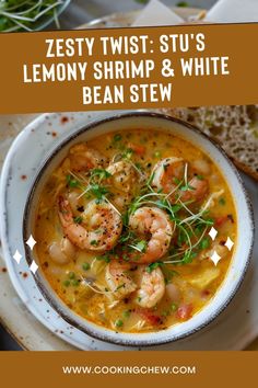 a bowl of soup with shrimp and white bean stew on the side, next to a slice of bread