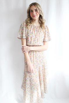 Adorned with lovely lavender flowers, it's the ideal choice for Easter or any sunny day! Dress Lining, Lovely Lavender, Perfume Scents, Floral Embroidered Dress, Lavender Flowers, V Cut, V Cuts, Ditsy Floral, Sunny Day