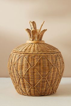 a wicker basket sitting on top of a table