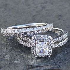 two wedding rings with diamonds on them