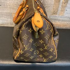 Louis Vuitton Monogram Speedy 30 In good condition. Comes with dust bag and certificate of ity. Louis Vuitton Vernis Alma, Speedy Bag, Tote Outfit, Multiple Pictures, Louis Vuitton Speedy 30, At The Store, Speedy 30, Lv Monogram, Louis Vuitton Speedy