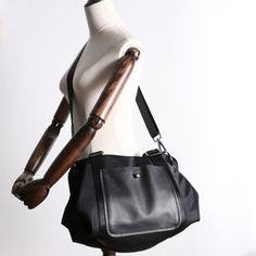 Overview： Design: Black Nylon Shoulder Bag Handbag Women's Nylon Crossbody Bag Black Crossbody Nylon Bag In Stock: Ready to Ship (2-4 days)Include: Only BagCustom: NoColor: BlackLeather: Nylon, LeatherMeasures: 37 cm x 30cm x 20cm Weight: 0.65kgSlots: 2 main slots, 2 zipper slot, 1 phone pocket, 1 wallet pocket, 2 side slotsAccessories(option): NoneStyle: Black Nylon Shoulder Bag Handbag Women's Nylon Crossbody Bag Black Crossbody Nylon Bag Very durable (At least 5 Years) and it should last a li Black Nylon Satchel Shoulder Bag, Nylon Tote Shoulder Bag For Commuting, Nylon Commuting Shoulder Tote Bag, Black Nylon Shoulder Bag With Adjustable Strap, Black Nylon Crossbody Shoulder Bag, Nylon Shoulder Bag With Removable Pouch For Commuting, Black Nylon Shoulder Bag With Removable Pouch, Black Nylon Shoulder Bag With Zipper Pocket, Everyday Black Nylon Shoulder Bag