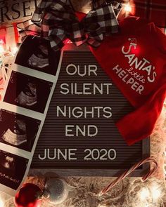 a sign that says our silent nights end june 2020 with christmas decorations and lights around it