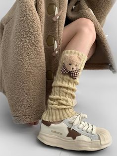 Embrace the kawaii fashion trend with these irresistibly cute knit leg warmers, embellished with charming teddy decorations. Available in three versatile colors—Khaki, Coffee, and White—these leg warmers are the perfect blend of style and comfort. Garment SizeSizeFree SizeFull Length40.5Cuff16/18 Cute Fitted Winter Socks, Cute Fitted Leg Warmers For Fall, Casual Acrylic Socks For Fall, Acrylic Casual Socks For Fall, Trendy Winter Socks, Trendy Knitted Socks For Spring, Casual Brown Leg Warmers For Winter, Casual Brown Warm Leg Warmers, Casual Brown Leg Warmers