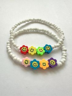 This listing is for 1 smiley flower bracelet. Bracelet is made of polymer clay smiley flower beads made with glass seed beads. Great for summer! Handmade. Made in USA Smiley Flower, Beaded Braclets, Bracelet Summer, Summer Bracelet, Fun Bracelet, Diy Bracelets Easy