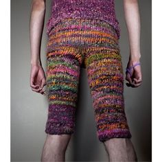 a man wearing colorful knitted shorts and socks