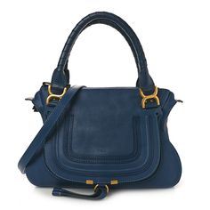 This is an authentic CHLOE Calfskin Medium Marcie Satchel in Scuba Blue. This stylish satchel is crafted of finely detailed calfskin leather in blue. The bag features wrapped leather top handles, an optional shoulder strap with brass hardware, and a frontal flap pocket. The top zipper opens to a khaki green fabric interior with zipper and patch pockets. Chloe Marcie Bag, Chloe Marcie, Green Fabric, Khaki Green, Leather Top, Flap Pocket, Patch Pocket, Bucket Bag, Calf Skin