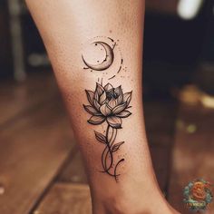 a woman's foot with a flower and moon tattoo on the side of her leg