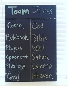 a chalk board with words written on it in front of a window that says team jesus