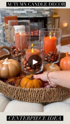 a basket filled with candles sitting on top of a table