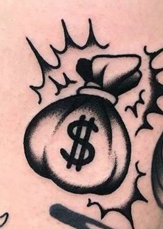 a black and white tattoo with a bag of money