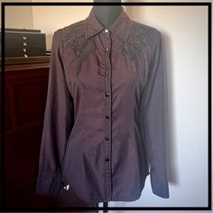 Hello Darling! Roar, From Buckle, Dark Plum Button Up Shirt With Black Pinstripes, Black Graphic Design, Embroidery, Studs, And Rhinestones, And Black Snap Buttons. Very Good Condition - Only Sign Of Wear Is Very Minimal Wear On The Black Coloring Of A Couple Of The Snaps. No Other Signs Of Wear Or Flaws. Never Worn! A Lot Of Buckle In My Closet So Many Gorgeous Pieces In My Closet From Buckle And All The Brands They Carry - Rocker Styles, Bohemian Styles, Grunge Styles - All So Breathtaking! Do Elegant Purple Cotton Blouse, Embellished Fitted Shirt For Workwear, Elegant Black Embellished Shirt, Black Graphic Design, Hello Darling, Rocker Style, Design Embroidery, 2024 Fashion, Black Rhinestone