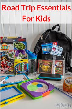 the road trip essentials for kids are organized and ready to be carried out on the road