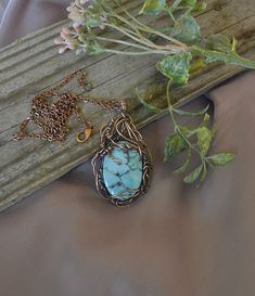 Stone Wind hammered copper natural stone jewelry: https://www.etsy.com/shop/thestonewind/ Beautiful hammered wire wrapped copper pendant  necklace with light blue turquoise Magnesite stone focal on an antiqued copper chain necklace.  100% hand made - unique and unusual gift for men or for Mother's day. Turquoise is said to be a purification stone, dispelling negative energy to instill inner calm thereby promoting inner attunement and enhancing communication with the physical and spiritual worlds Handmade Copper Turquoise Necklace As Gift, Hand Wrapped Blue Copper Necklaces, Artisan Wire Wrapped Turquoise Necklace Gift, Blue Wire Wrapped Turquoise Necklace Gift, Blue Copper Wire Wrapped Necklace, Unusual Gifts For Men, Blue Turquoise Wire-wrapped Necklace Gift, Ocean Jasper Wire Wrapped Pendant Necklaces, Handmade Gifts For Him