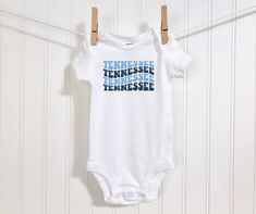 Tennessee Football Baby Onesie® Tennessee Football Infant Bodysuit Tennessee Football Fan Baby Shower Gift Football Onesie® for Newborn by MadebyOTBB on Etsy Hockey Onesie, Montreal Hockey, Football Onesie, Basketball Baby, New York Football, Hockey Baby, Newborn Onesies, Football Baby, England Football