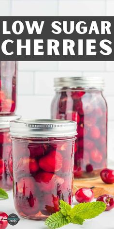 jars filled with cranberry sauce and garnished with mint leaves