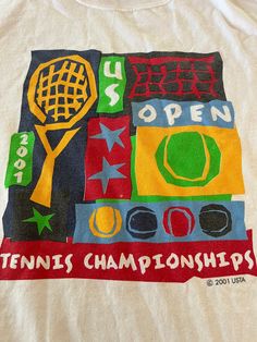 a t - shirt with the words tennis championships printed on it