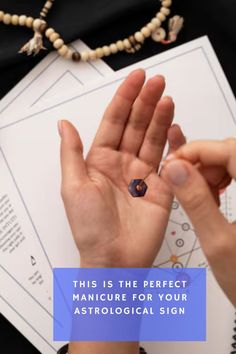 a person holding their hand up to the camera with text that reads, this is the perfect manicure for your astrological sign