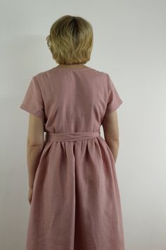 "Spring dress, Write the selected color in the message Handmade rose wrap dress with short sleeves, 2 pockets and belt , perfect for casual wear and suitable for any occasion in any season Details: - 100% natural linen produced in Europe ; - medium weight (180 gram per square meter); - color: rose, could be any from our colors catalog (color samples at the photo); Made to order, approximately a few days, If you have any questions please message me and I will be glad to answer. Size guide : Size Pink Belted Short Sleeve Dress, Linen Belted Dress For Daywear, Linen Tie Waist Dress For Daywear, Relaxed Fit Belted Linen Dress, Fitted Linen Dress With Tie Waist, Short Sleeve Linen Sundress, Pink Linen Dress With Short Sleeves, Pink Short Sleeve Linen Dress, Knee-length Linen Belted Dress