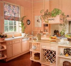 a kitchen filled with lots of counter top space next to a stove top oven and sink