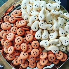 a platter filled with lots of halloween cookies