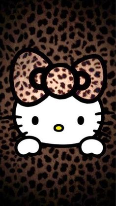 an image of a hello kitty with leopard print on it's head and ears