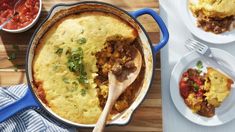 a casserole dish with meat and vegetables in it