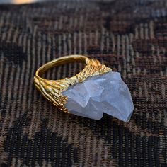 GemFormingStudio D E T A I L S Crystal Ring | Raw Crystal Ring | Ring For Her | Ring For Women | Gift For Her | Gift For Women | Electroplated Ring | Brass Ring [GFS3028] Stone mm: 30X20 MM Ring Size : 6.5 Gram : 13.20 GM Color : White Material : Brass Polish : Gold Plated Contact us for wholesale prices. R I N G S https://www.etsy.com/in-en/shop/GemFormingStudio?section_id=22783374 B E A D S https://www.etsy.com/in-en/shop/GemFormingStudio?section_id=22828835 W A N D S https://www.etsy.com/in-e Minimalist Crystal And Metal Ring As A Gift, Spiritual Stackable Crystal Open Ring, Spiritual Stackable Open Crystal Ring, Spiritual Open Ring Crystal Promise Ring, White Spiritual Crystal Open Ring, Spiritual White Crystal Open Ring, Gold Spiritual Crystal Promise Ring, Brass Polish, Rough Stone Ring