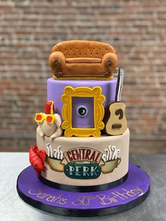 a cake that is decorated to look like a couch and chair with the words central perk on it