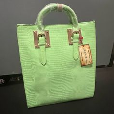 Beautiful Mint Green Handbag With Crocodile Embossed Look. Manmade Materials Brandnew! Size As Shown In Photos. Can Be Carried Or Worn Crossbody With Strap That Is Included. Green Crocodile Pattern Satchel For Daily Use, Chic Green Satchel With Crocodile Pattern, Chic Green Bags With Crocodile Pattern, Green Crocodile Pattern Shoulder Bag For Shopping, Green Crocodile Pattern Satchel With Double Handle, Green Crocodile Pattern Handheld Bag, Green Rectangular Satchel With Silver-tone Hardware, Green Crocodile Pattern Tote Bag, Green Double Handle Bags With Gold-tone Hardware