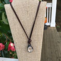 Tune it to your natural side with this fabulous necklace! This unique necklace features a large crystal or tree charm pendant on leather cord. Both pendants can be beautifully layered with a shacket or sweater. Large Crystal, Tree Pendant, Unique Necklace, Large Crystals, Leather Necklace, Unique Necklaces, Leather Cord, Clear Crystal, Charm Pendant