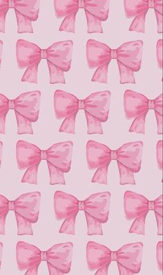 a pink bow pattern on a white background