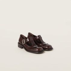 Dark Brown Leather T-bar Shoes | Miu Miu Mary Jane Loafers, Bar Shoes, Metal Lettering, T Bar Shoes, Lettering Logo, Shoe Inspo, Brown Top, Dark Brown Leather, Rubber Heels